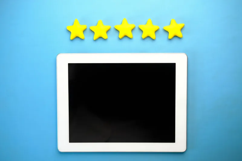 Tablet showing five yellow stars, representing product review ratings