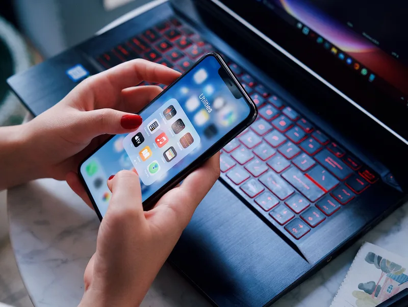 Person connecting apps and reviewing integration settings on a computer screen