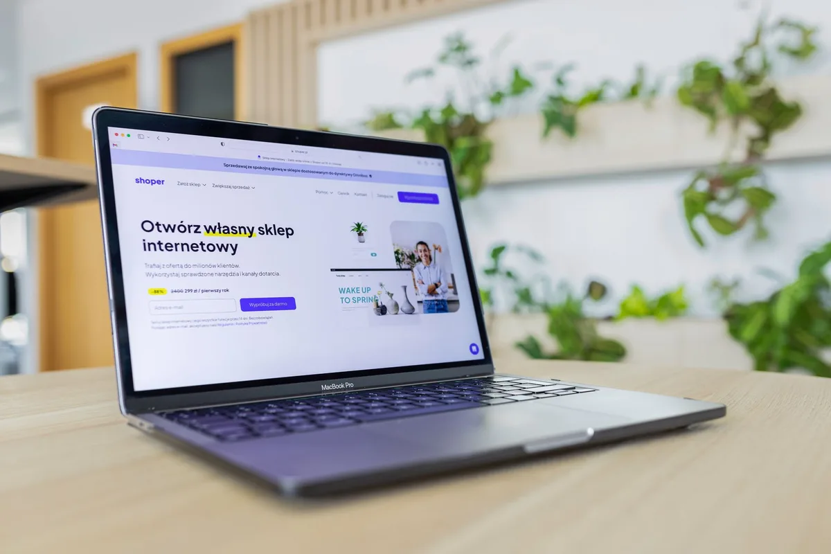 Laptop with ecommerce website open representing email marketing tool selection for online stores