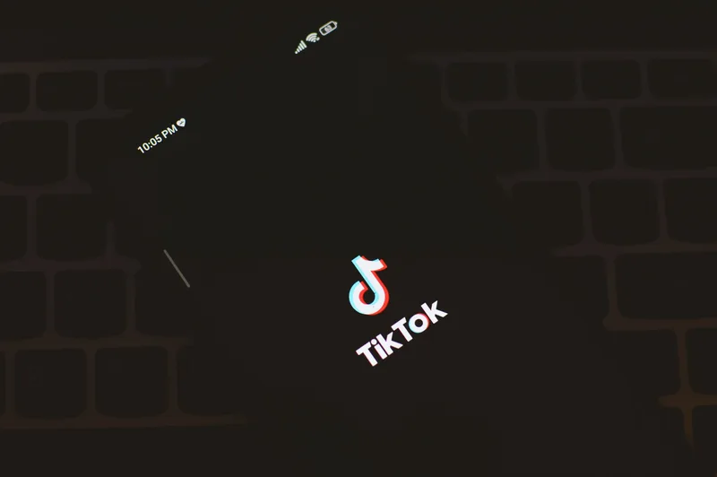 Comparison of TikTok ad format types on mobile: In-Feed Ads, Spark Ads, and TikTok Shop Ads